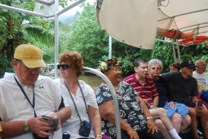 Our cruise on the Faaroa River on Raiatea, Society Islands, French Polynesia.  Bernadette is in the middle wearing the native headdress.©Jean Janssen