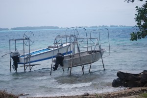 Traditionally, the islanders kept their boats raised to protect the wood from rotting out. Even though most of the boats are now made from fiberglass, the tradition of the raised boat continues.©Jean Janssen
