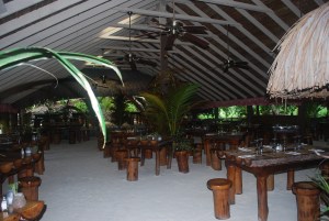 Interior of Bloody Mary's on Bora Bora built in the traditional Polynesia style.  It even has a sand floor.©Jean Janssen