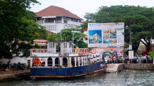 Car ferry at Fort Kochi, India.  Note all the cycles on the right waiting to get on. ©Jean Janssen