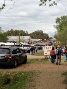 The road was backed with shoppers and vendors heading in both directions.  Warrenton, Texas.©Jean Janssen