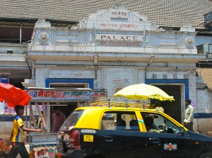 The Palace Theater, one of the original movie theaters in Mumbai.  Notice the reference to "talkies" at the top. ©Jean Janssen