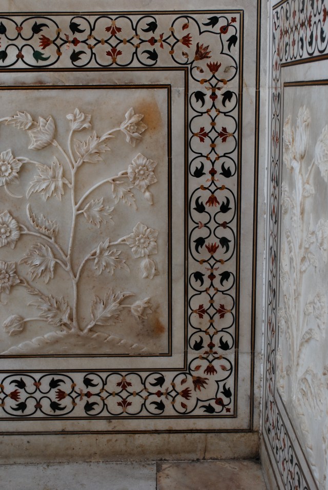 The colorful markings are inlaid semi-precious stones with the marble flowers cut from a single slab of marble for each panel. ©Jean Janssen