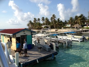 Some of the Turneffe Flats staff gave us a send-off at the dock on the morning of our departure. ©Jean Janssen