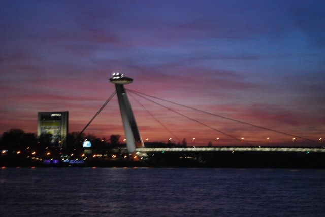 The Suspension bridge in Bratislava, Slovakia at sunset as seen from our cabin aboard the River Beatrice, Uniworld. ©Jean Janssen