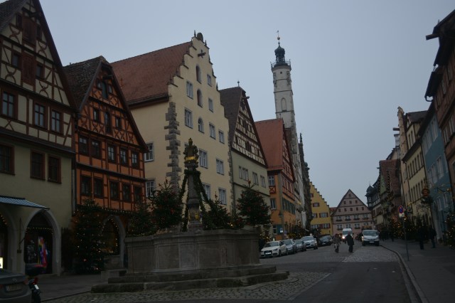 View toward Marktplatz from Herrngasse with the Herrenbrunnen (gentry well) in the foreground.   Rothenburg, Germany ©Jean Janssen