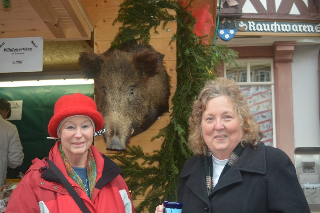 Susan and Janet pose with the Wild Boar at our sausage booth.  Wertheim, Germany ©Jean Janssen