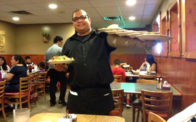 At server did an excellent job of managing all our plates at El Arriero on 28th Street in Grand Rapids, Michigan ©Jean Janssen