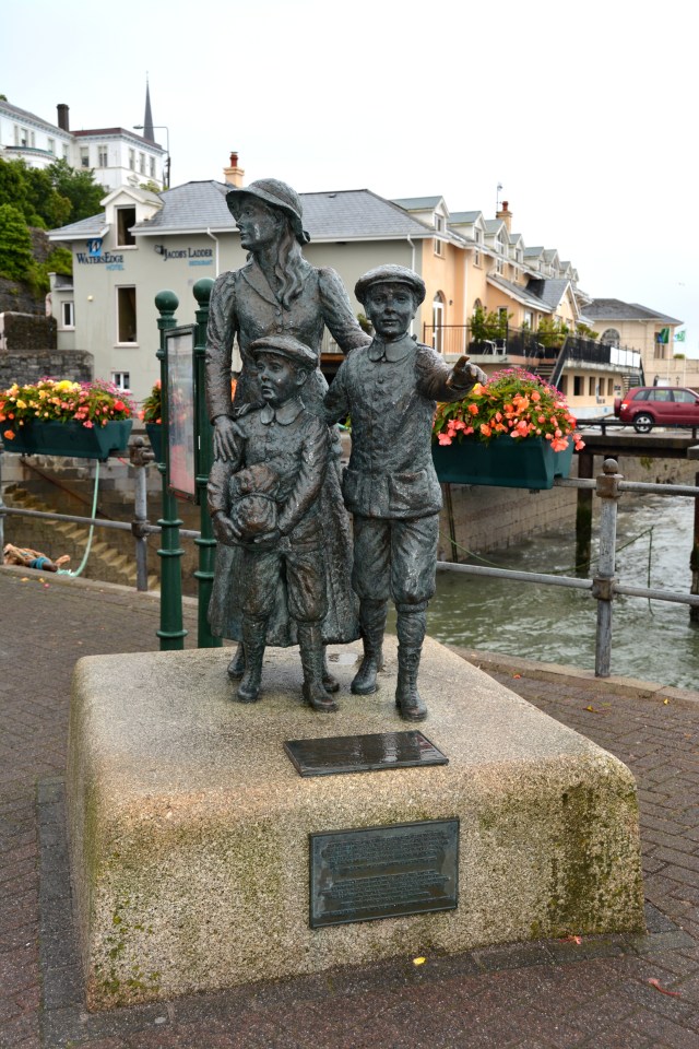 The first immigrant admitted to Ellis Island was a young girl who left from Cobh, Ireland. This statute sits on the passenger dock at Cobh. ©Jean Janssen