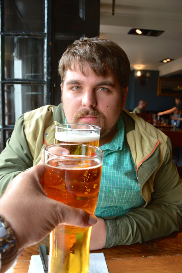 A toast with our first glass at Deacon Brodie's Tavern on the Royal Mile, Edinburgh, Scotland ©Jean Janssen