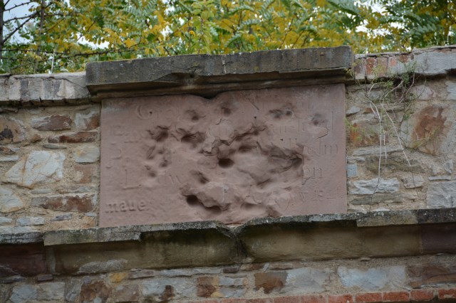 The nazi symbol was once at this spot, the guide suggested these were marks from American guns, Ehrenbreitstein Fortress, near Koblenz, Germany. ©Jean Janssen