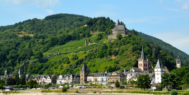 Castle along the Rhine, Germany. Note the amazing city walls on the hillside. ©Jean Janssen